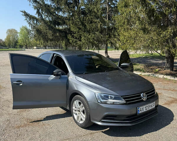 Серый Фольксваген Джетта, объемом двигателя 1.4 л и пробегом 126 тыс. км за 9600 $, фото 5 на Automoto.ua