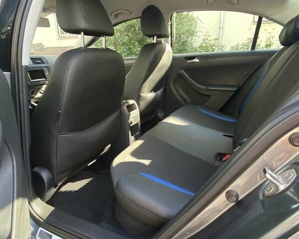 Серый Фольксваген Джетта, объемом двигателя 1.4 л и пробегом 172 тыс. км за 9490 $, фото 6 на Automoto.ua