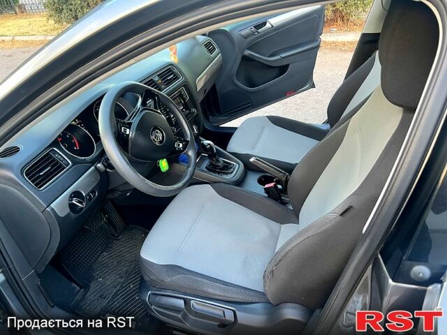 Серый Фольксваген Джетта, объемом двигателя 1.4 л и пробегом 220 тыс. км за 8500 $, фото 5 на Automoto.ua