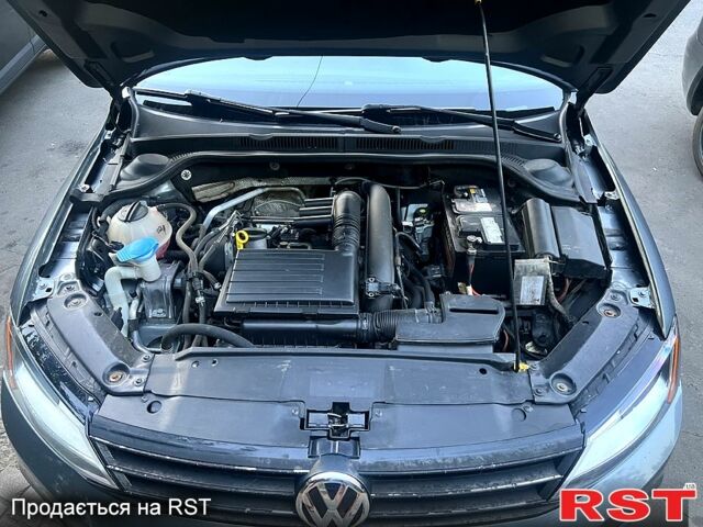 Серый Фольксваген Джетта, объемом двигателя 1.4 л и пробегом 220 тыс. км за 8500 $, фото 7 на Automoto.ua