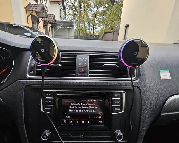 Сірий Фольксваген Джетта, об'ємом двигуна 1.4 л та пробігом 80 тис. км за 10499 $, фото 38 на Automoto.ua