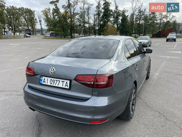 Серый Фольксваген Джетта, объемом двигателя 1.4 л и пробегом 215 тыс. км за 7650 $, фото 5 на Automoto.ua