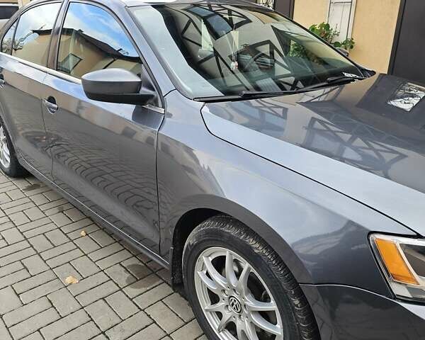 Сірий Фольксваген Джетта, об'ємом двигуна 1.4 л та пробігом 80 тис. км за 10499 $, фото 20 на Automoto.ua