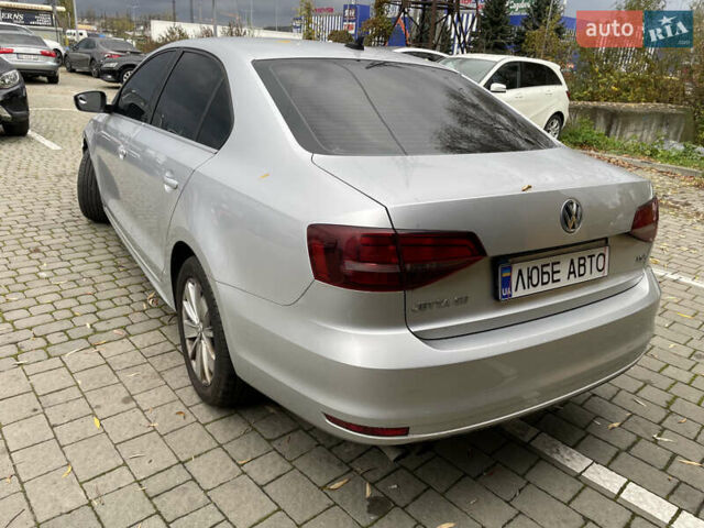 Серый Фольксваген Джетта, объемом двигателя 1.4 л и пробегом 166 тыс. км за 9500 $, фото 3 на Automoto.ua