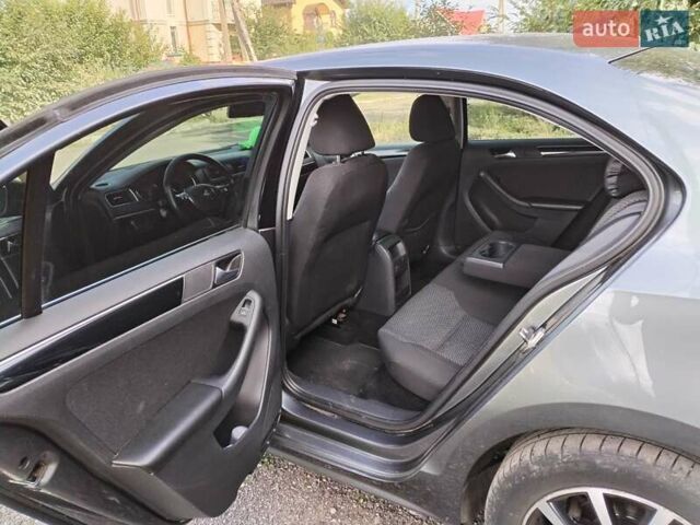 Серый Фольксваген Джетта, объемом двигателя 1.4 л и пробегом 201 тыс. км за 11500 $, фото 11 на Automoto.ua