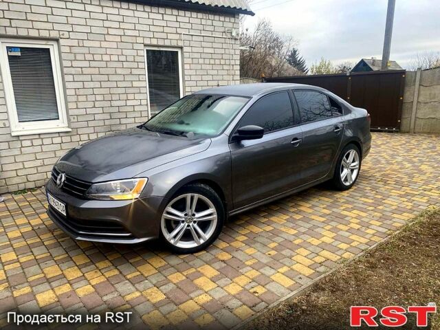 Сірий Фольксваген Джетта, об'ємом двигуна 1.4 л та пробігом 122 тис. км за 9300 $, фото 4 на Automoto.ua