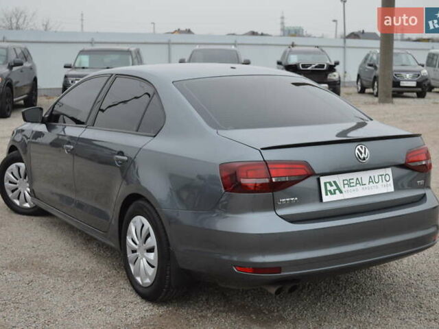 Серый Фольксваген Джетта, объемом двигателя 1.4 л и пробегом 110 тыс. км за 12800 $, фото 2 на Automoto.ua