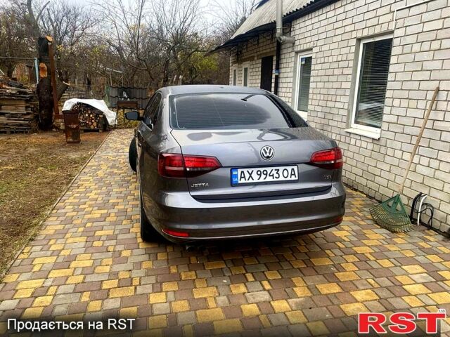Сірий Фольксваген Джетта, об'ємом двигуна 1.4 л та пробігом 122 тис. км за 9300 $, фото 3 на Automoto.ua