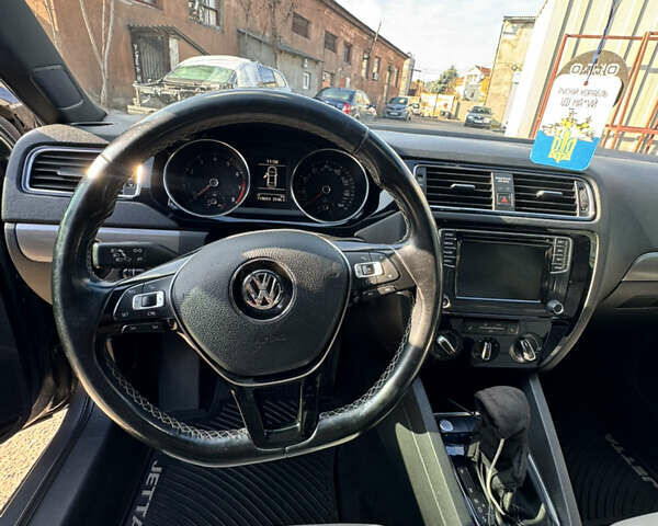 Серый Фольксваген Джетта, объемом двигателя 1.8 л и пробегом 119 тыс. км за 12000 $, фото 9 на Automoto.ua