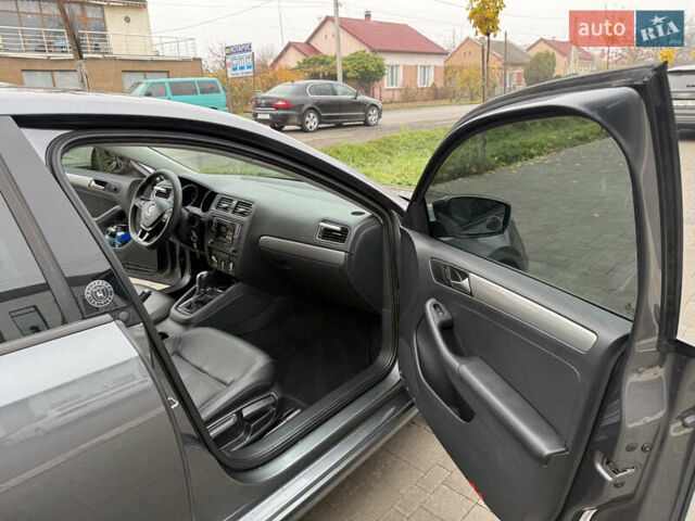 Сірий Фольксваген Джетта, об'ємом двигуна 1.39 л та пробігом 102 тис. км за 12200 $, фото 10 на Automoto.ua