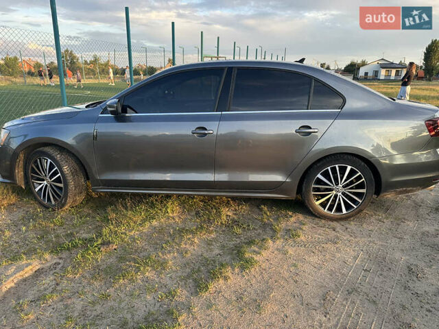Серый Фольксваген Джетта, объемом двигателя 1.39 л и пробегом 149 тыс. км за 10500 $, фото 1 на Automoto.ua