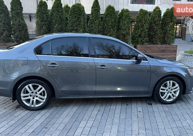 Серый Фольксваген Джетта, объемом двигателя 1.39 л и пробегом 168 тыс. км за 9700 $, фото 9 на Automoto.ua