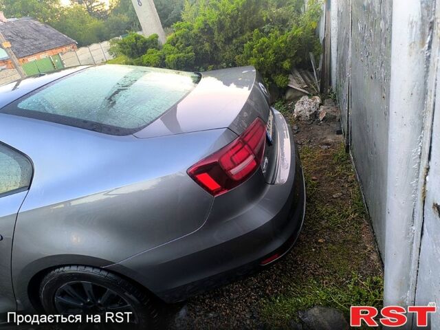 Серый Фольксваген Джетта, объемом двигателя 1.4 л и пробегом 86 тыс. км за 10300 $, фото 4 на Automoto.ua