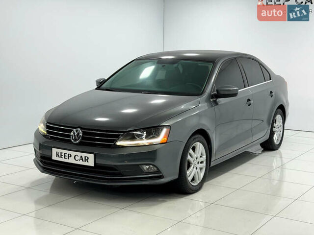 Серый Фольксваген Джетта, объемом двигателя 1.4 л и пробегом 110 тыс. км за 8250 $, фото 1 на Automoto.ua