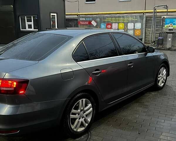 Серый Фольксваген Джетта, объемом двигателя 1.4 л и пробегом 88 тыс. км за 11000 $, фото 9 на Automoto.ua