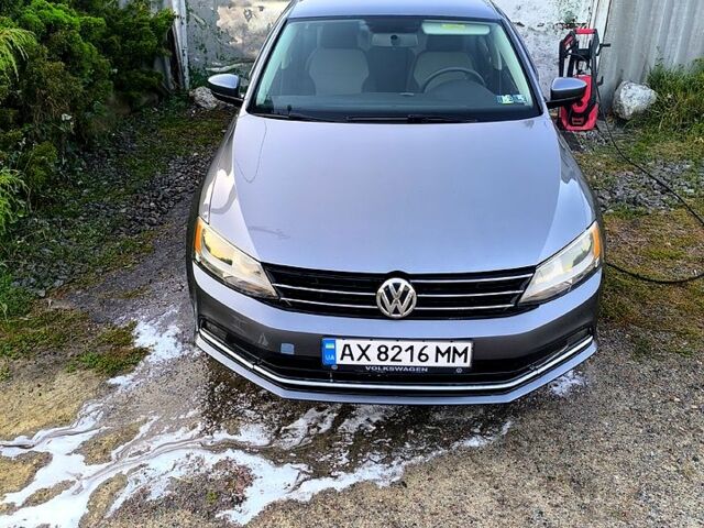 Серый Фольксваген Джетта, объемом двигателя 1.4 л и пробегом 86 тыс. км за 10300 $, фото 1 на Automoto.ua