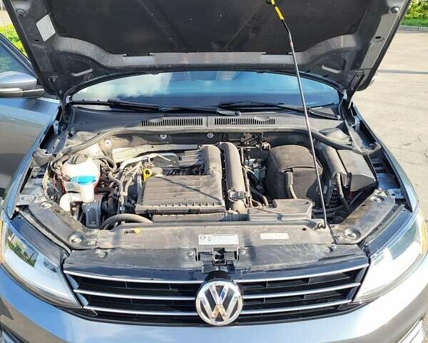 Серый Фольксваген Джетта, объемом двигателя 1.4 л и пробегом 119 тыс. км за 12700 $, фото 18 на Automoto.ua