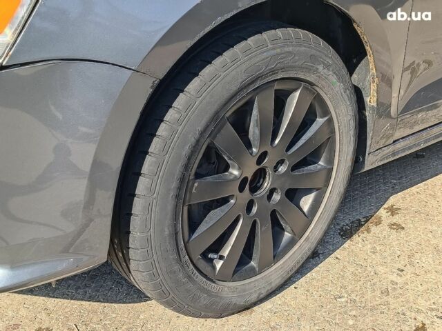 Серый Фольксваген Джетта, объемом двигателя 1.4 л и пробегом 86 тыс. км за 10890 $, фото 6 на Automoto.ua