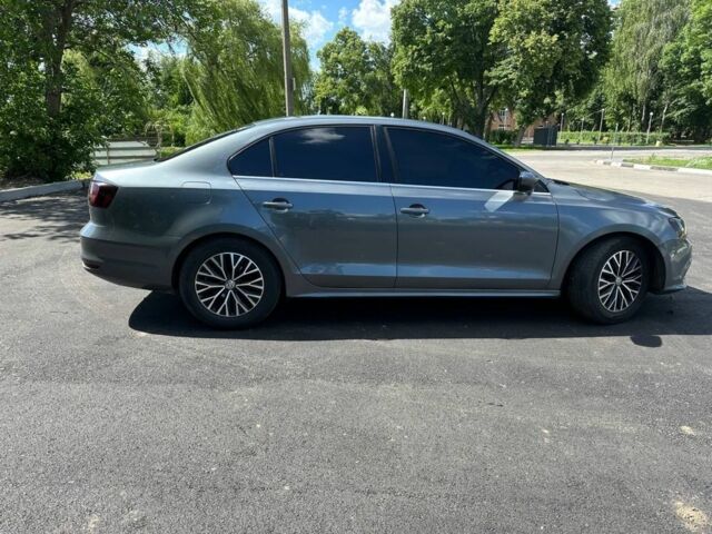 Серый Фольксваген Джетта, объемом двигателя 1.4 л и пробегом 190 тыс. км за 5700 $, фото 3 на Automoto.ua