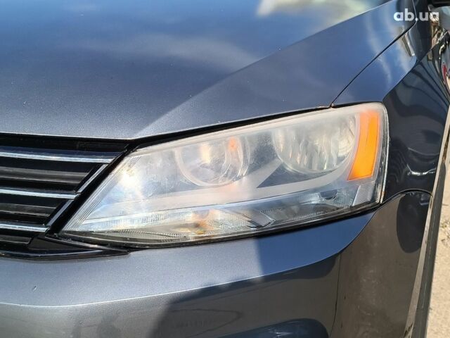 Серый Фольксваген Джетта, объемом двигателя 1.4 л и пробегом 86 тыс. км за 10890 $, фото 5 на Automoto.ua