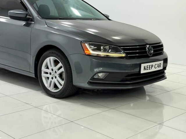 Серый Фольксваген Джетта, объемом двигателя 1.4 л и пробегом 110 тыс. км за 8200 $, фото 5 на Automoto.ua