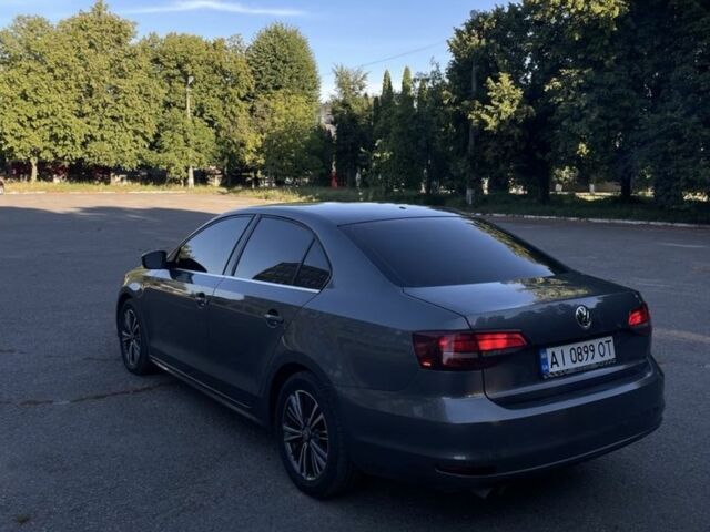 Сірий Фольксваген Джетта, об'ємом двигуна 1.4 л та пробігом 202 тис. км за 8850 $, фото 3 на Automoto.ua