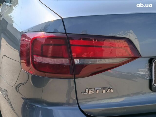 Серый Фольксваген Джетта, объемом двигателя 1.4 л и пробегом 86 тыс. км за 10890 $, фото 10 на Automoto.ua