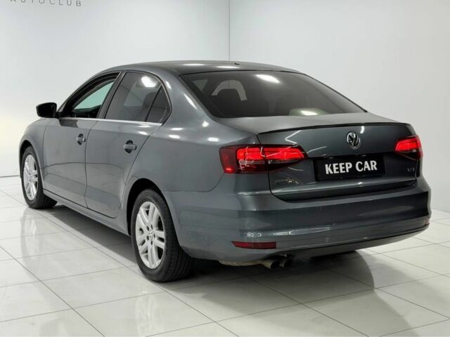 Серый Фольксваген Джетта, объемом двигателя 1.4 л и пробегом 110 тыс. км за 8200 $, фото 3 на Automoto.ua