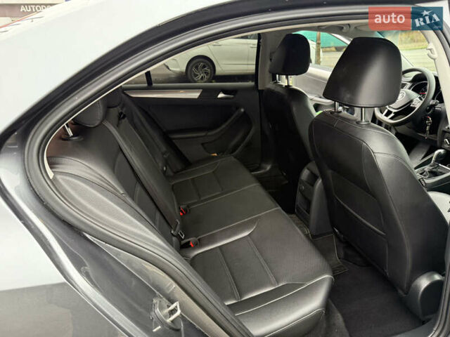 Сірий Фольксваген Джетта, об'ємом двигуна 1.39 л та пробігом 102 тис. км за 12200 $, фото 12 на Automoto.ua