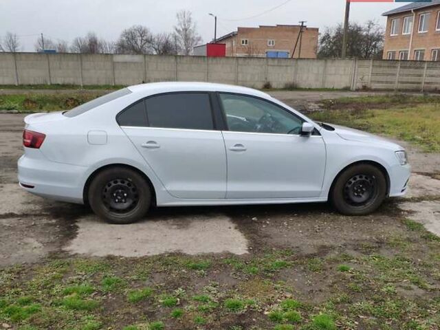 Серый Фольксваген Джетта, объемом двигателя 1.4 л и пробегом 61 тыс. км за 14200 $, фото 2 на Automoto.ua