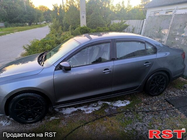 Серый Фольксваген Джетта, объемом двигателя 1.4 л и пробегом 86 тыс. км за 10300 $, фото 2 на Automoto.ua