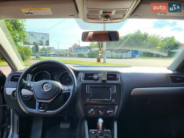 Серый Фольксваген Джетта, объемом двигателя 1.4 л и пробегом 119 тыс. км за 12700 $, фото 7 на Automoto.ua