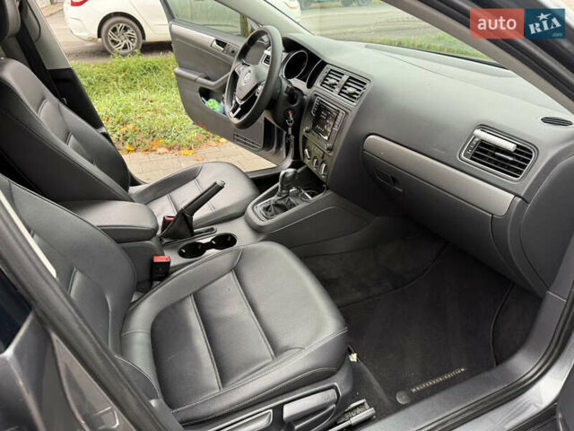 Сірий Фольксваген Джетта, об'ємом двигуна 1.39 л та пробігом 102 тис. км за 12200 $, фото 11 на Automoto.ua