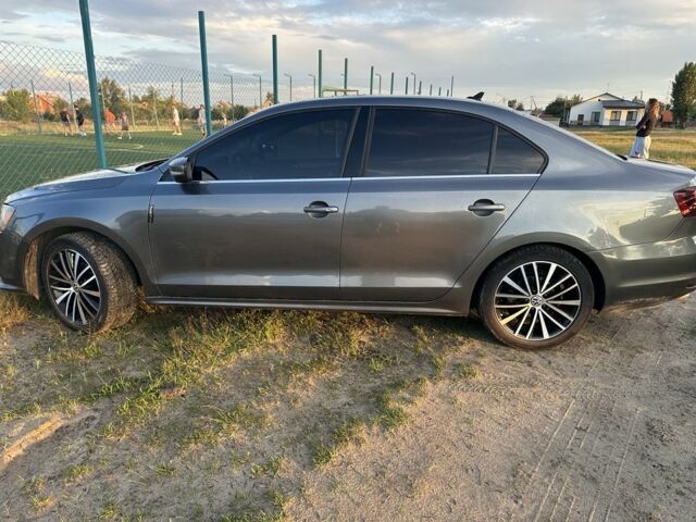 Сірий Фольксваген Джетта, об'ємом двигуна 1.4 л та пробігом 149 тис. км за 11500 $, фото 1 на Automoto.ua