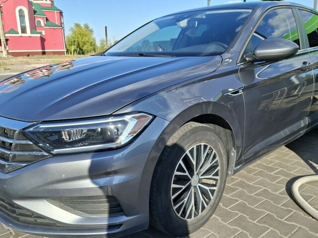 Серый Фольксваген Джетта, объемом двигателя 1.4 л и пробегом 100 тыс. км за 16500 $, фото 3 на Automoto.ua