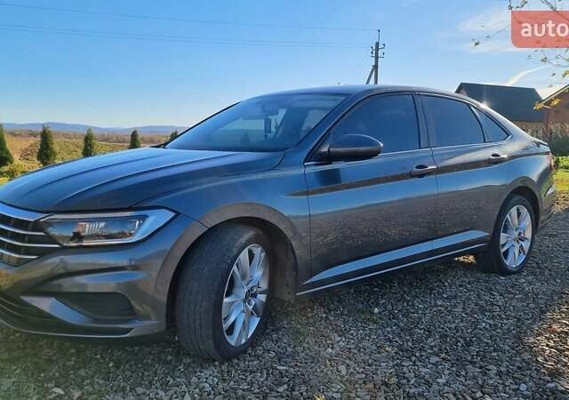 Серый Фольксваген Джетта, объемом двигателя 1.4 л и пробегом 67 тыс. км за 14000 $, фото 3 на Automoto.ua