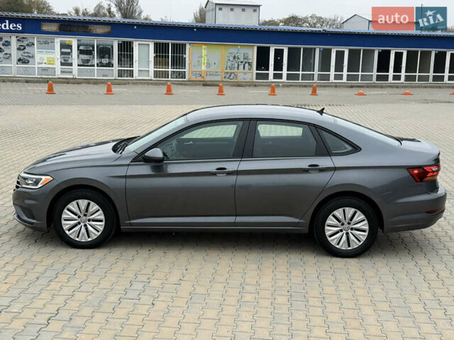 Сірий Фольксваген Джетта, об'ємом двигуна 1.4 л та пробігом 190 тис. км за 13700 $, фото 5 на Automoto.ua