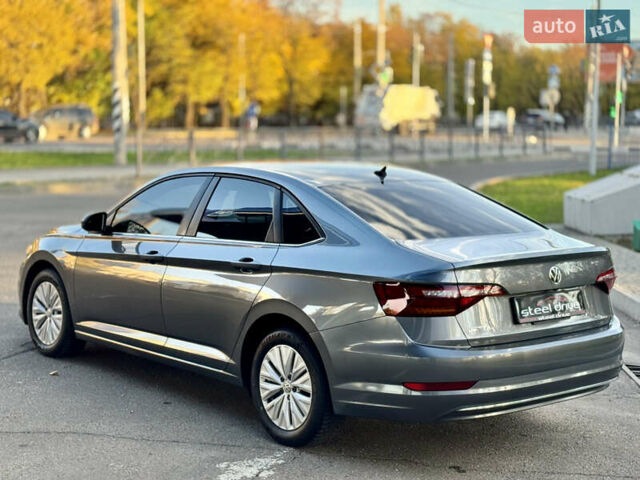 Серый Фольксваген Джетта, объемом двигателя 1.4 л и пробегом 123 тыс. км за 14799 $, фото 4 на Automoto.ua