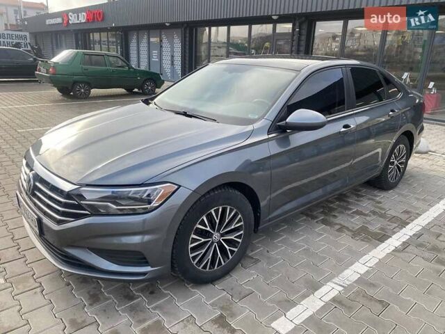 Серый Фольксваген Джетта, объемом двигателя 1.4 л и пробегом 96 тыс. км за 17600 $, фото 2 на Automoto.ua