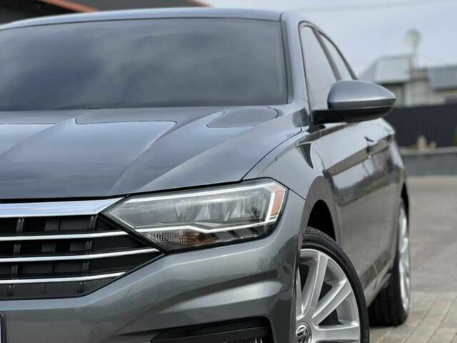 Сірий Фольксваген Джетта, об'ємом двигуна 1.4 л та пробігом 129 тис. км за 14500 $, фото 3 на Automoto.ua