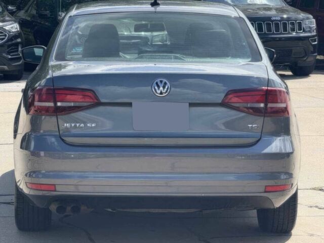 Серый Фольксваген Джетта, объемом двигателя 1.4 л и пробегом 47 тыс. км за 2300 $, фото 6 на Automoto.ua