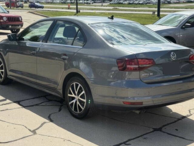 Серый Фольксваген Джетта, объемом двигателя 1.4 л и пробегом 47 тыс. км за 2300 $, фото 5 на Automoto.ua