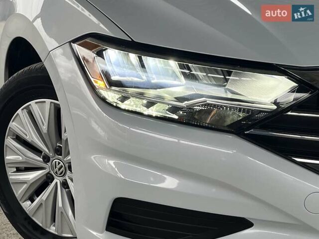 Серый Фольксваген Джетта, объемом двигателя 1.39 л и пробегом 47 тыс. км за 14499 $, фото 5 на Automoto.ua