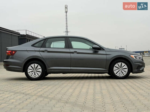 Сірий Фольксваген Джетта, об'ємом двигуна 1.4 л та пробігом 190 тис. км за 13700 $, фото 4 на Automoto.ua