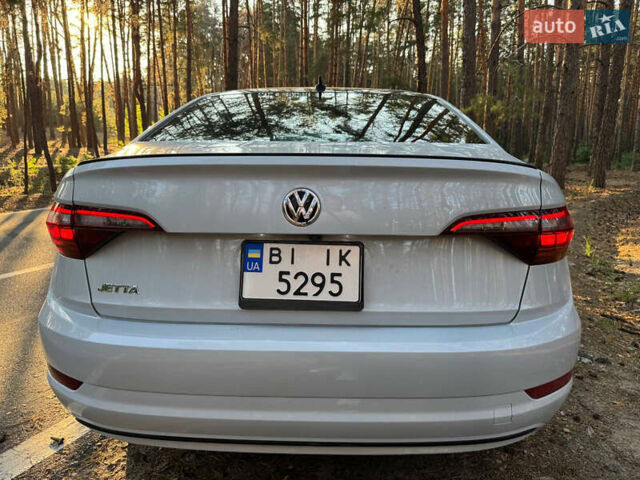 Сірий Фольксваген Джетта, об'ємом двигуна 1.4 л та пробігом 151 тис. км за 12950 $, фото 2 на Automoto.ua
