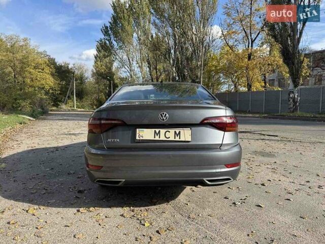 Серый Фольксваген Джетта, объемом двигателя 1.4 л и пробегом 81 тыс. км за 16855 $, фото 3 на Automoto.ua