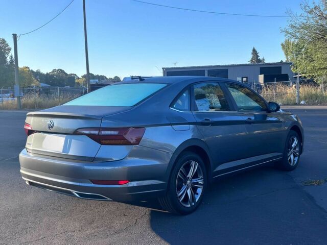 Серый Фольксваген Джетта, объемом двигателя 1.4 л и пробегом 32 тыс. км за 9500 $, фото 3 на Automoto.ua