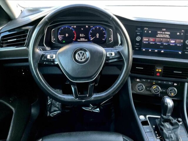 Серый Фольксваген Джетта, объемом двигателя 1.4 л и пробегом 39 тыс. км за 3950 $, фото 5 на Automoto.ua