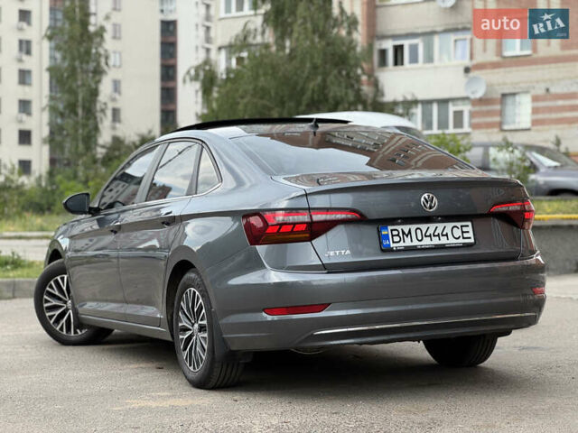 Серый Фольксваген Джетта, объемом двигателя 1.4 л и пробегом 99 тыс. км за 17777 $, фото 2 на Automoto.ua