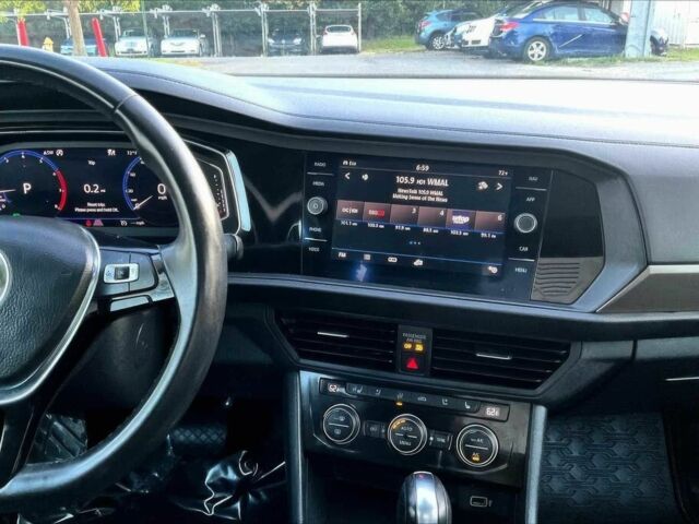 Серый Фольксваген Джетта, объемом двигателя 1.4 л и пробегом 39 тыс. км за 3950 $, фото 10 на Automoto.ua